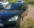 Чорний Міцубісі Lancer, об'ємом двигуна 1.58 л та пробігом 270 тис. км за 2900 $, фото 1 на Automoto.ua