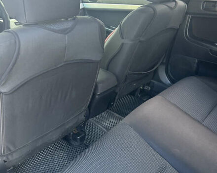 Черный Мицубиси Лансер, объемом двигателя 2 л и пробегом 208 тыс. км за 6500 $, фото 12 на Automoto.ua