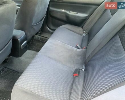 Черный Мицубиси Лансер, объемом двигателя 1.58 л и пробегом 237 тыс. км за 3950 $, фото 8 на Automoto.ua