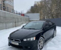 Чорний Міцубісі Lancer, об'ємом двигуна 2 л та пробігом 198 тис. км за 5300 $, фото 1 на Automoto.ua