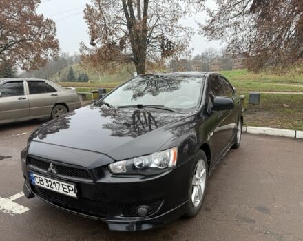 Черный Мицубиси Лансер, объемом двигателя 2 л и пробегом 281 тыс. км за 6000 $, фото 1 на Automoto.ua