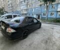 Черный Мицубиси Лансер, объемом двигателя 2 л и пробегом 240 тыс. км за 5600 $, фото 3 на Automoto.ua