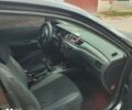 Черный Мицубиси Лансер, объемом двигателя 1.6 л и пробегом 169 тыс. км за 5400 $, фото 10 на Automoto.ua