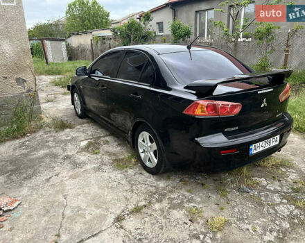 Чорний Міцубісі Lancer, об'ємом двигуна 2 л та пробігом 200 тис. км за 6900 $, фото 5 на Automoto.ua
