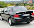 Чорний Міцубісі Lancer, об'ємом двигуна 1.6 л та пробігом 243 тис. км за 4950 $, фото 25 на Automoto.ua