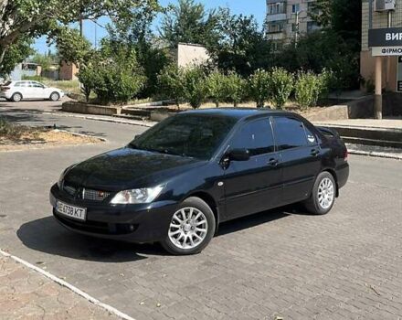 Черный Мицубиси Лансер, объемом двигателя 1.6 л и пробегом 249 тыс. км за 5000 $, фото 5 на Automoto.ua