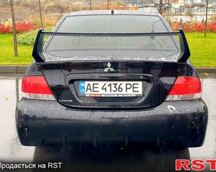 Чорний Міцубісі Lancer, об'ємом двигуна 1.6 л та пробігом 196 тис. км за 3900 $, фото 4 на Automoto.ua