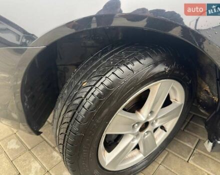 Черный Мицубиси Лансер, объемом двигателя 2 л и пробегом 259 тыс. км за 6500 $, фото 8 на Automoto.ua