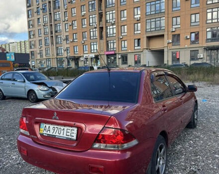 Чорний Міцубісі Lancer, об'ємом двигуна 1.6 л та пробігом 195 тис. км за 5000 $, фото 11 на Automoto.ua