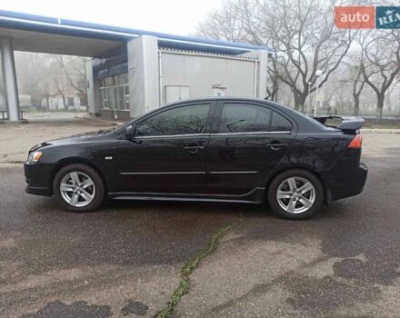 Черный Мицубиси Лансер, объемом двигателя 2 л и пробегом 195 тыс. км за 7899 $, фото 7 на Automoto.ua