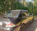 Чорний Міцубісі Lancer, об'ємом двигуна 2 л та пробігом 290 тис. км за 3300 $, фото 2 на Automoto.ua