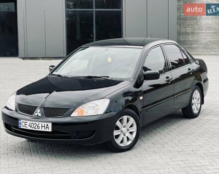 Чорний Міцубісі Lancer, об'ємом двигуна 1.6 л та пробігом 243 тис. км за 4950 $, фото 4 на Automoto.ua