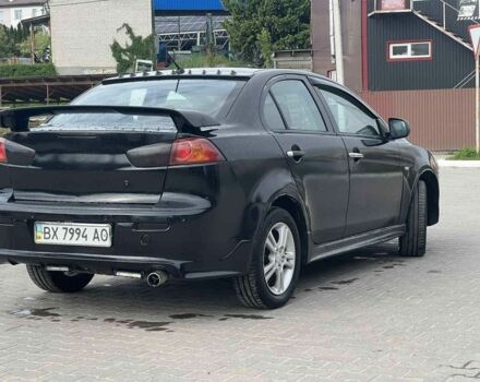 Черный Мицубиси Лансер, объемом двигателя 2 л и пробегом 350 тыс. км за 4299 $, фото 3 на Automoto.ua