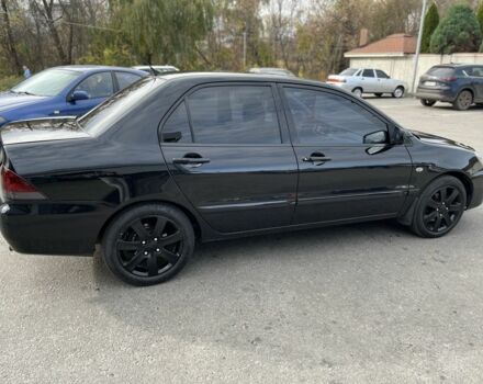 Чорний Міцубісі Lancer, об'ємом двигуна 1.6 л та пробігом 250 тис. км за 4800 $, фото 3 на Automoto.ua