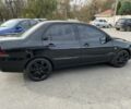 Чорний Міцубісі Lancer, об'ємом двигуна 1.6 л та пробігом 250 тис. км за 4800 $, фото 3 на Automoto.ua