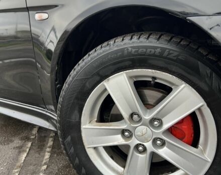 Черный Мицубиси Лансер, объемом двигателя 2 л и пробегом 350 тыс. км за 6700 $, фото 7 на Automoto.ua