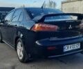 Міцубісі Lancer 2007 у Києві на Automoto.ua Чорний Міцубісі Lancer, об'ємом двигуна 2 л та пробігом 238 тис. км за 5350 $, фото 4 на Automoto.ua