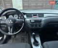 Черный Мицубиси Лансер, объемом двигателя 1.58 л и пробегом 240 тыс. км за 5000 $, фото 10 на Automoto.ua