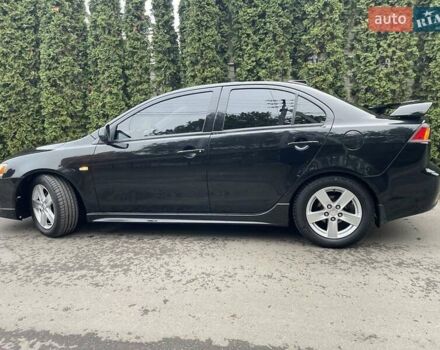 Чорний Міцубісі Lancer, об'ємом двигуна 2 л та пробігом 69 тис. км за 6200 $, фото 6 на Automoto.ua