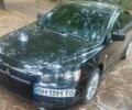 Чорний Міцубісі Lancer, об'ємом двигуна 2 л та пробігом 230 тис. км за 6450 $, фото 1 на Automoto.ua