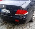 Черный Мицубиси Лансер, объемом двигателя 1.6 л и пробегом 223 тыс. км за 4300 $, фото 6 на Automoto.ua