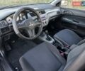Черный Мицубиси Лансер, объемом двигателя 1.58 л и пробегом 139 тыс. км за 5200 $, фото 32 на Automoto.ua