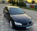 Чорний Міцубісі Lancer, об'ємом двигуна 1.6 л та пробігом 185 тис. км за 4100 $, фото 1 на Automoto.ua