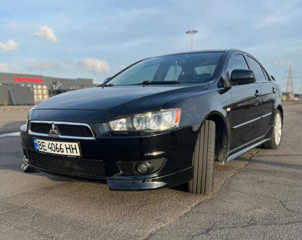 Черный Мицубиси Лансер, объемом двигателя 2 л и пробегом 193 тыс. км за 7500 $, фото 1 на Automoto.ua