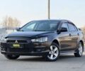 Чорний Міцубісі Lancer, об'ємом двигуна 2 л та пробігом 228 тис. км за 6950 $, фото 1 на Automoto.ua