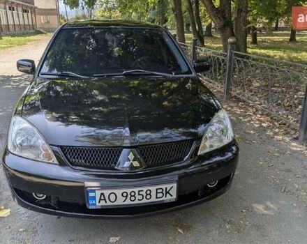 Чорний Міцубісі Lancer, об'ємом двигуна 1.6 л та пробігом 366 тис. км за 3500 $, фото 8 на Automoto.ua