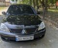 Чорний Міцубісі Lancer, об'ємом двигуна 1.6 л та пробігом 366 тис. км за 3500 $, фото 8 на Automoto.ua