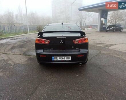 Черный Мицубиси Лансер, объемом двигателя 2 л и пробегом 195 тыс. км за 7899 $, фото 5 на Automoto.ua