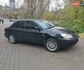 Чорний Міцубісі Lancer, об'ємом двигуна 1.58 л та пробігом 190 тис. км за 3750 $, фото 19 на Automoto.ua