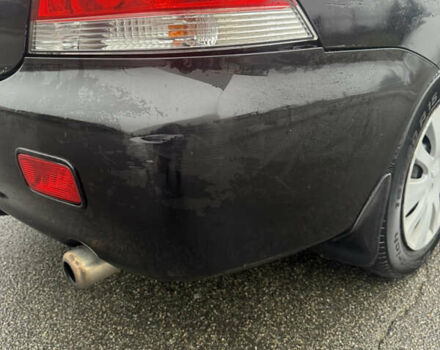 Чорний Міцубісі Lancer, об'ємом двигуна 1.58 л та пробігом 256 тис. км за 3700 $, фото 35 на Automoto.ua