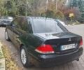 Чорний Міцубісі Lancer, об'ємом двигуна 1.58 л та пробігом 190 тис. км за 3750 $, фото 23 на Automoto.ua