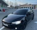 Черный Мицубиси Лансер, объемом двигателя 2 л и пробегом 245 тыс. км за 6950 $, фото 1 на Automoto.ua