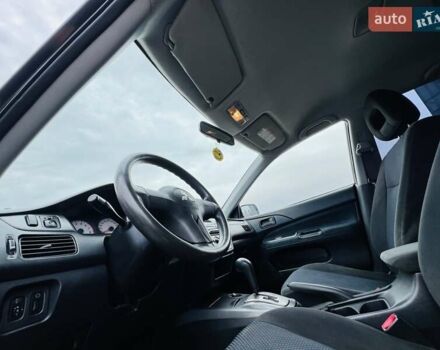 Чорний Міцубісі Lancer, об'ємом двигуна 1.6 л та пробігом 243 тис. км за 4950 $, фото 34 на Automoto.ua