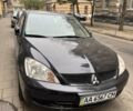 Чорний Міцубісі Lancer, об'ємом двигуна 1.6 л та пробігом 153 тис. км за 5500 $, фото 1 на Automoto.ua