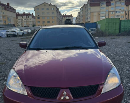 Чорний Міцубісі Lancer, об'ємом двигуна 1.6 л та пробігом 195 тис. км за 5000 $, фото 9 на Automoto.ua
