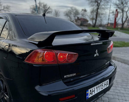 Черный Мицубиси Лансер, объемом двигателя 2 л и пробегом 245 тыс. км за 6200 $, фото 8 на Automoto.ua