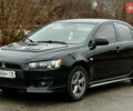 Черный Мицубиси Лансер, объемом двигателя 2 л и пробегом 215 тыс. км за 5500 $, фото 1 на Automoto.ua