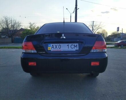 Черный Мицубиси Лансер, объемом двигателя 1.6 л и пробегом 32 тыс. км за 9000 $, фото 17 на Automoto.ua