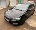 Чорний Міцубісі Lancer, об'ємом двигуна 2 л та пробігом 216 тис. км за 5700 $, фото 1 на Automoto.ua