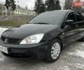Чорний Міцубісі Lancer, об'ємом двигуна 1.58 л та пробігом 160 тис. км за 4600 $, фото 1 на Automoto.ua
