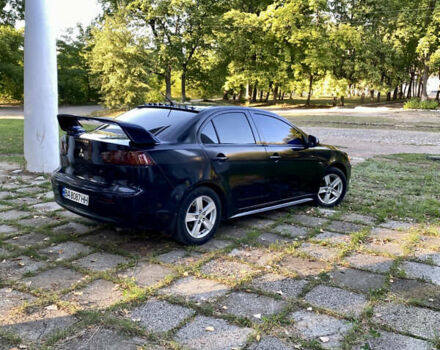 Чорний Міцубісі Lancer, об'ємом двигуна 2 л та пробігом 280 тис. км за 5200 $, фото 4 на Automoto.ua