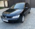 Чорний Міцубісі Lancer, об'ємом двигуна 1.6 л та пробігом 260 тис. км за 3600 $, фото 1 на Automoto.ua