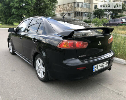 Чорний Міцубісі Lancer, об'ємом двигуна 2 л та пробігом 185 тис. км за 6950 $, фото 4 на Automoto.ua