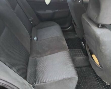 Черный Мицубиси Лансер, объемом двигателя 1.6 л и пробегом 309 тыс. км за 4000 $, фото 6 на Automoto.ua