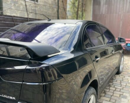 Чорний Міцубісі Lancer, об'ємом двигуна 2 л та пробігом 175 тис. км за 6500 $, фото 5 на Automoto.ua