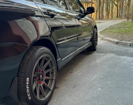 Черный Мицубиси Лансер, объемом двигателя 1.6 л и пробегом 211 тыс. км за 5600 $, фото 3 на Automoto.ua